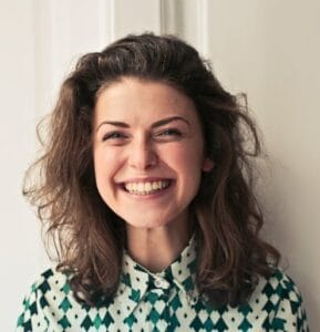 women smiling at camera