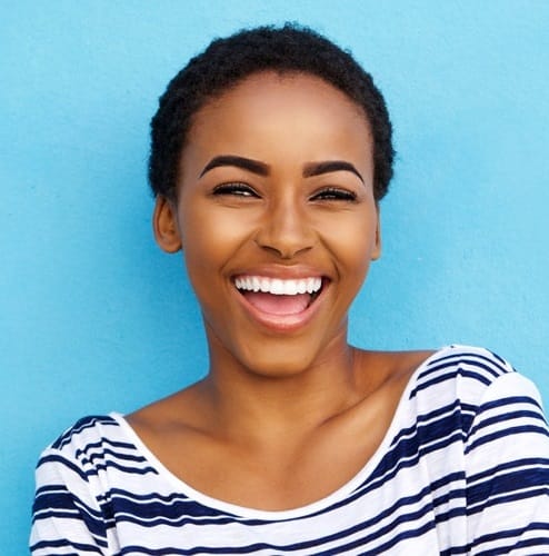 women smiling at camera